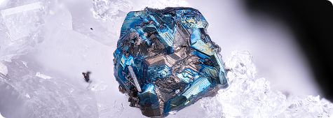 Antimony Trioxide | Polymer Additives Group a Crystalline Mineral Specimen of Blue and Gray Stibnite, the Primary Source for Antimony Trioxide Production.