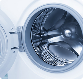 Appliances | Polymer Additives Group Open Front-loading Washing Machine Drum Representing Home Appliances Requiring Flame Retardant Additives.